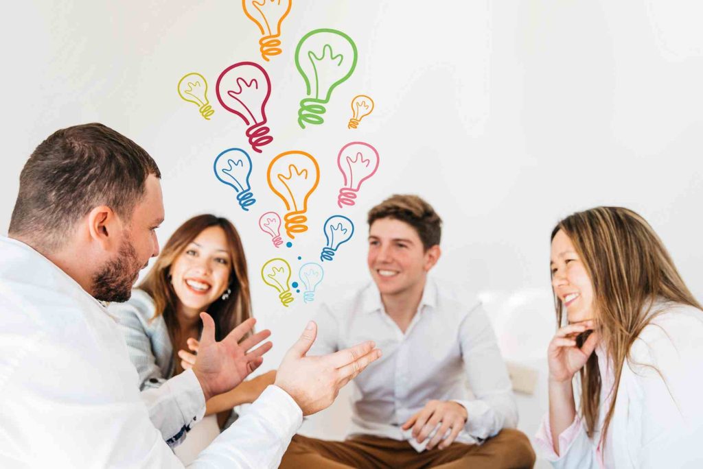 a group of peoples discussing about outsourcing mobile app development